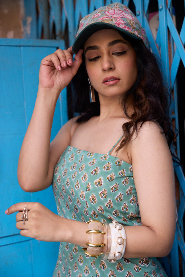 “Women wearing green hand block print cotton short kurti with jeans casual look”